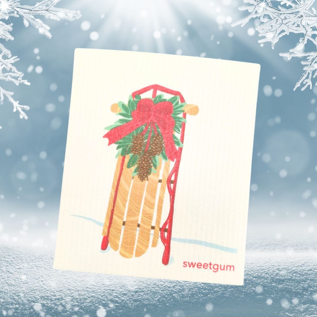 Sled with Red Bow & Pinecone Swag | Christmas & Winter Swedish Dishcloth Swedish Dishcloths sweetgum textiles company, LLC 